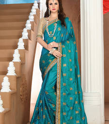 Party Wear Sarees buy green embroidered silk saree with blouse party-wear-saree online. buy  small 1d44ff3f4d093069d56e7327eedc29da60f5c0cc09300f652d7f464c9cb4e123 ASRUIEI